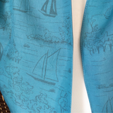 reverse-of-a-1930s-vintage-blue-satin-scarf-with-boats-on-white-mannequin