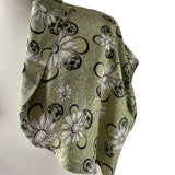 True vintage 1950's bolero jacket in a green beige and black Rayon satin floral print. at hurdyburdy vintage clothing shop