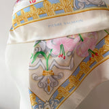 Floral Pierre Balmain vintage satin scarf with decorative border and pink lily print on a mannequin against a white background