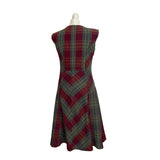Back view of a plaid vintage 90s Laura Ashley dress on a mannequin against a white background