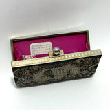 vintage-1950s-needlepoint-clutch-bag-with-shocking-pink-interior-and-brass-frame-by-peck-and-peck-fifth-avenue-on-white-background-at-hurdyburdy-shop