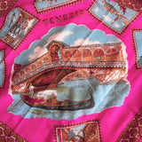 Shocking pink vintage Venice souvenir scarf featuring scenes and gondolas on white mannequin.