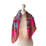 Shocking pink vintage Venice souvenir scarf featuring scenes and gondolas on white mannequin.