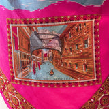 Shocking pink vintage Venice souvenir scarf featuring scenes and gondolas on white mannequin.
