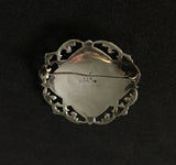 Mid Century Siam silver oval brooch of Siam Khon dancer
